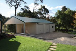 Custom designed steel garage with divided open bay by Judds Garages near the Hunter NSW