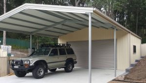Double garage with garaport in Teralba with vertical K panel in Classic Cream
