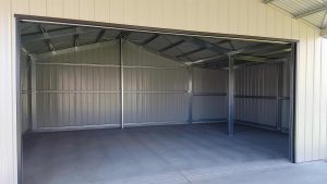Double garage with garaport and lean-to in Argenton with vertical K panel