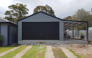 Double garage with single 5-metre roller door in horizontal M-panel cladding